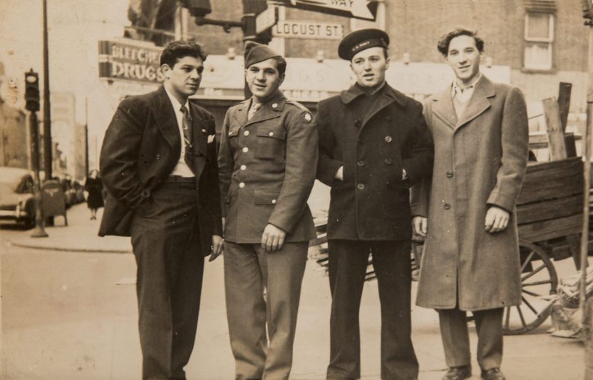 Four Men, Two Suits and Two Uniforms